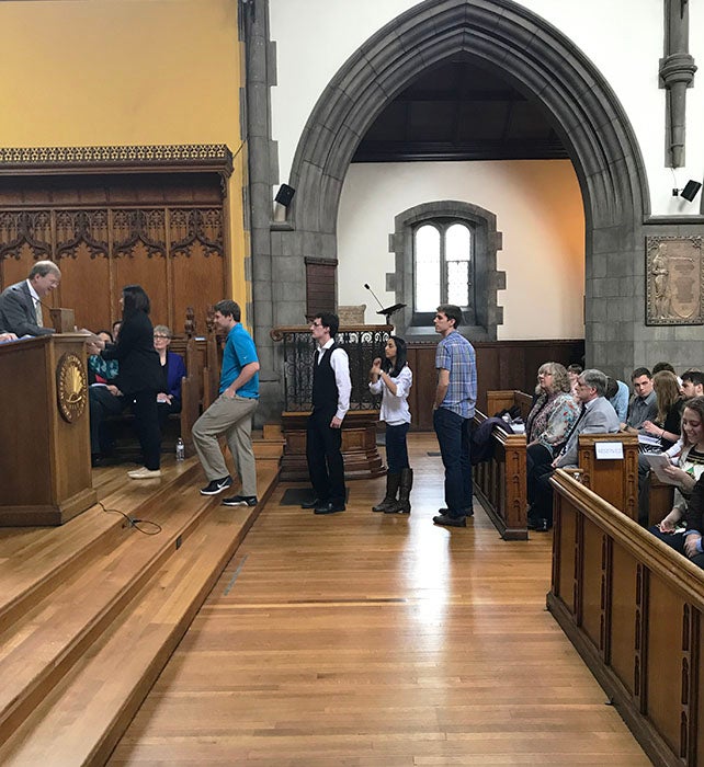 students going up to receive awards