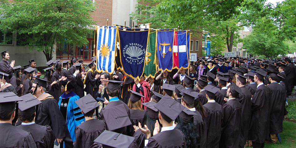 Case Western Reserve University Commencement 2017 banner guard leading the platform party to Veale Center for the ceremony