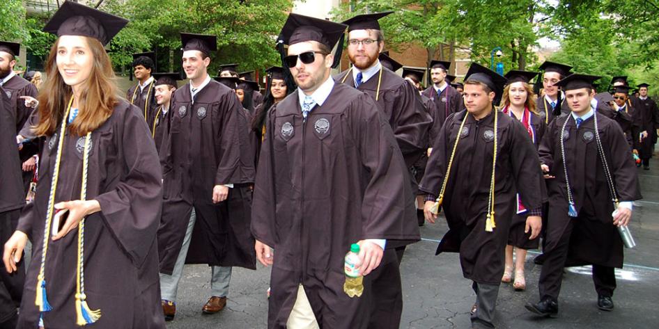 Case Western Reserve University Commencement 2017 undergraduates walking to Veale Center where ceremony is held