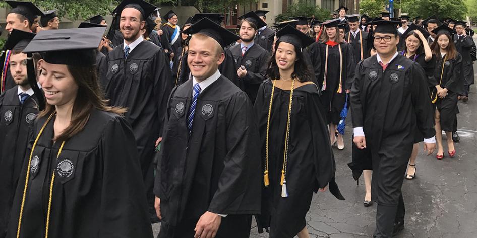 Case Western Reserve University Commencement 2017 graduating students walking to Veale Center for ceremony