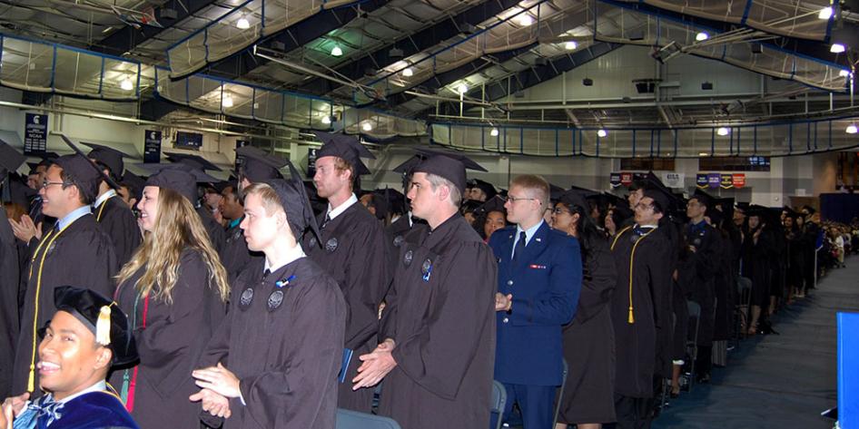 Case Western Reserve University Commencement 2017 students standing during ceremony in Veale Convocation Center