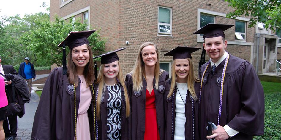 Case Western Reserve University Commencement 2017 group of graduating students posing for picture on quad