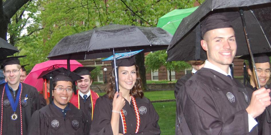 Case Western Reserve University Commencement 2016 small group of graduating students holding colorful umbrellas