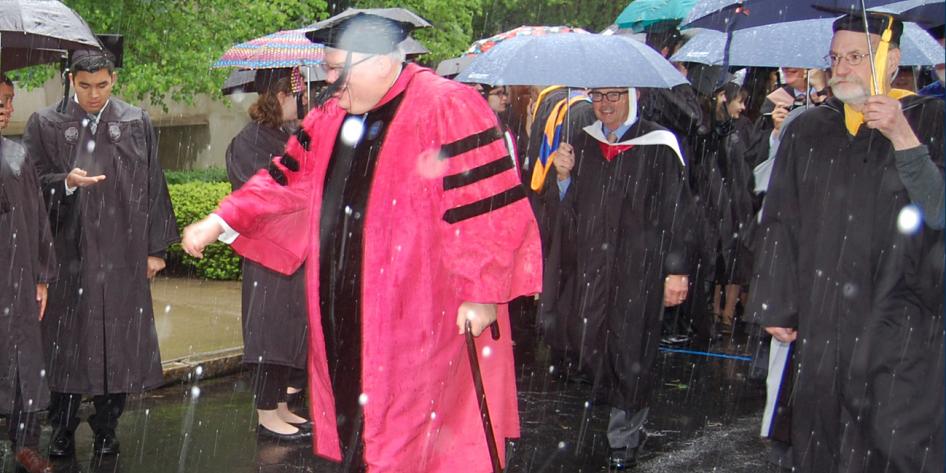 Case Western Reserve University Commencement 2016 graduating students and Dean Wolcowitz walking in snow 