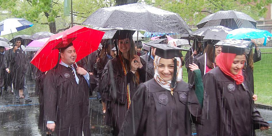 Case Western Reserve University Commencement 2016 graduating students smiling in snow outside