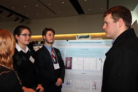  Nicholas Hazen, Grace Foxworthy, Hanna Huss, James McGinnity, and Nathaniel Landis presenting their poster