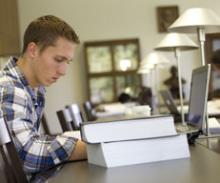male student studying