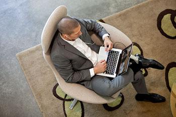 overhead shot of man on a laptop