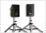 Speakers on tripods