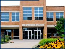 Outdoor Shot of the Veale Center's main door in springtime