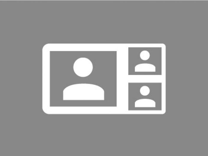 White Icon with a creen split three ways on a grey background