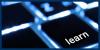 backlit keyboard with one key labeled "learn"