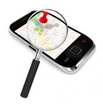 Smart phone graphic with a magifying glass over the screen which features a map app
