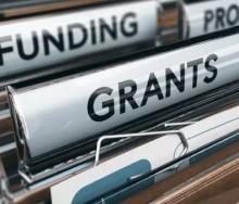 folders that say funding and grants