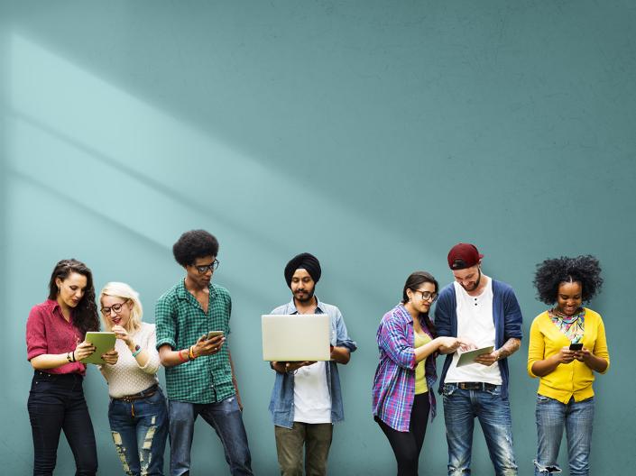 Multiple types of people using devices