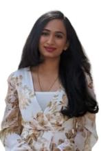 Disha Hedge headshot