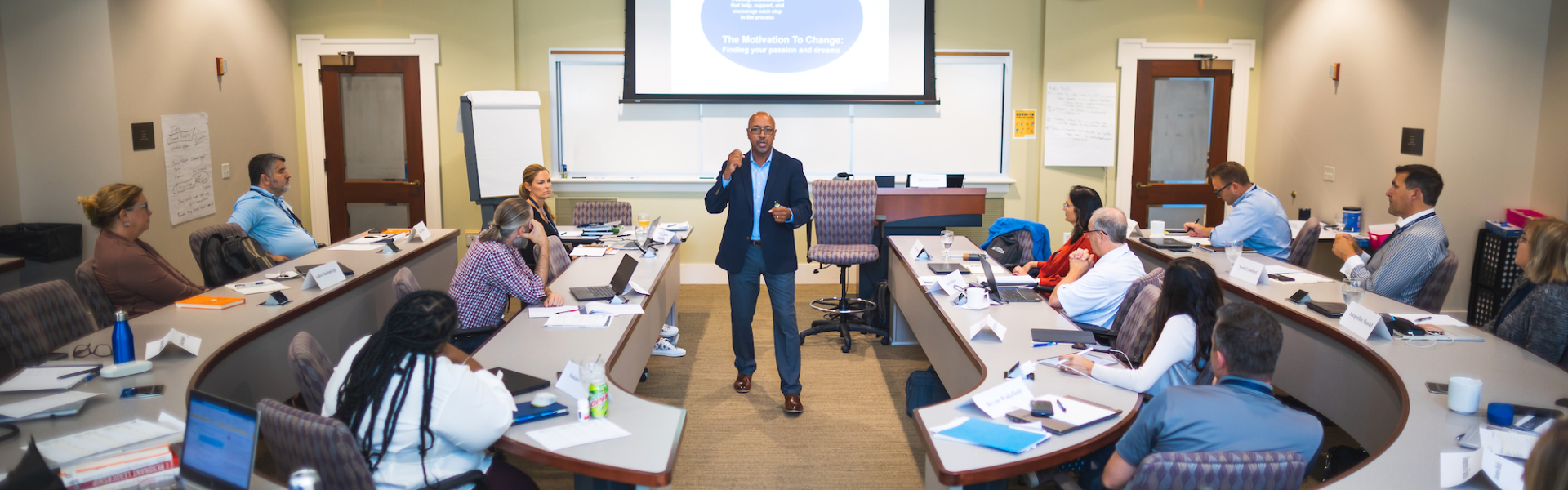 Photo of instructor Melvin Smith lecturing a class on leadership