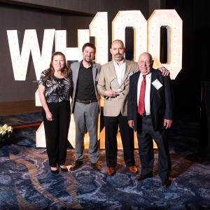 Members of Even Mix stand together with their Weatherhead 100 award