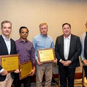 group of faculty members getting an award