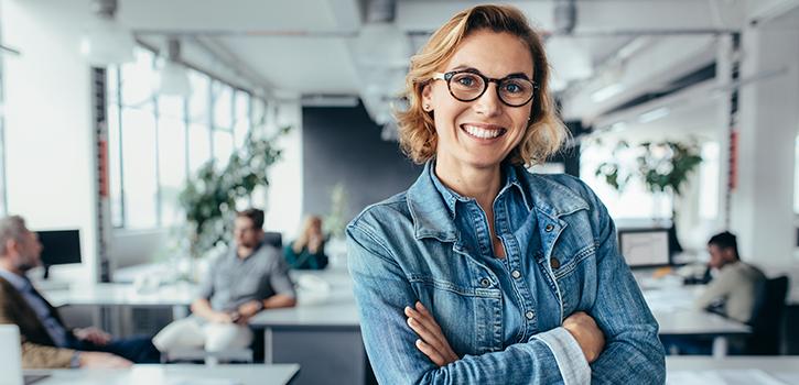 smiling woman with arms crossed