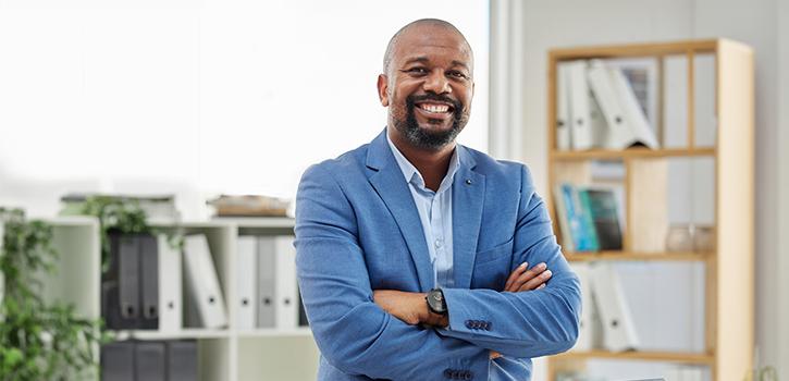 man smiling in office setting