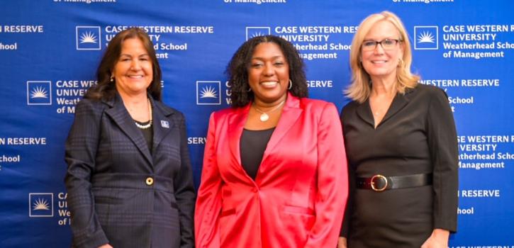 Laura Leopardi, Yvette Simpson, and Laura Guilliam pose for a photo at the Women's Leadership Luncheon