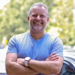 Photo of Jeff Tonidandel crossing his arms 