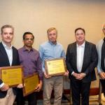 group of faculty members getting an award