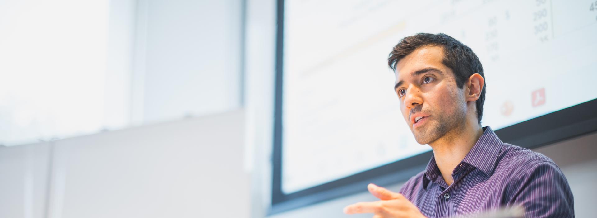 Photo of Jose Olavarria Baeza lecturing