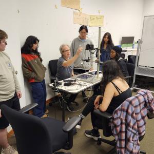 Student team learning to use recording technology