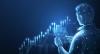 Blue Digital outline of man touching graph