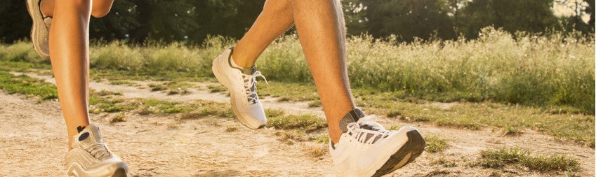 Picture of peoples feet while they run. 
