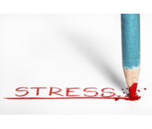 a pencil writing the word stress