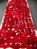 Table full of red hats.