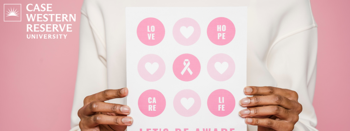 Person in a white outfit holding a flyer about breast cancer awareness in front of a pink background with a CWRU logo included