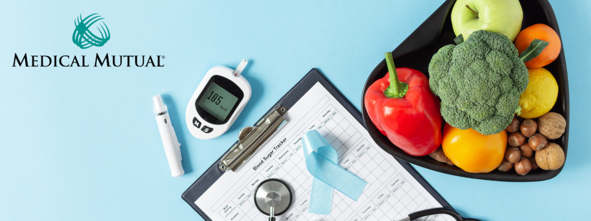 Diabetes supplies and bowl of vegetables over a blue background with the Medical Mutual logo included