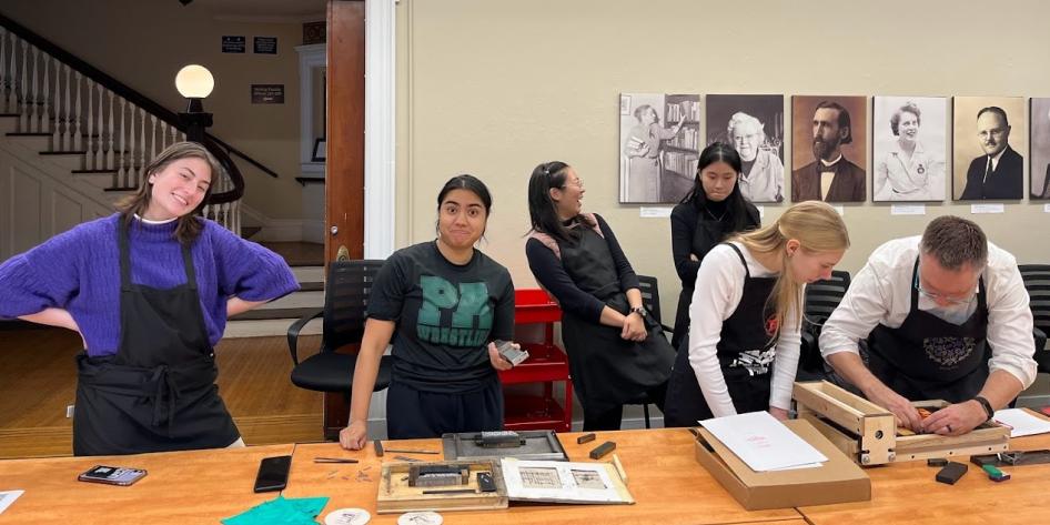 Students demonstrate letterpress offerings at the November 2022 Wayzgoose event.